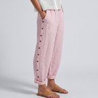 Women's striped cropped trousers with button side panels and turned-up cuffs
