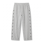 Women's striped cropped trousers with button side panels and turned-up cuffs