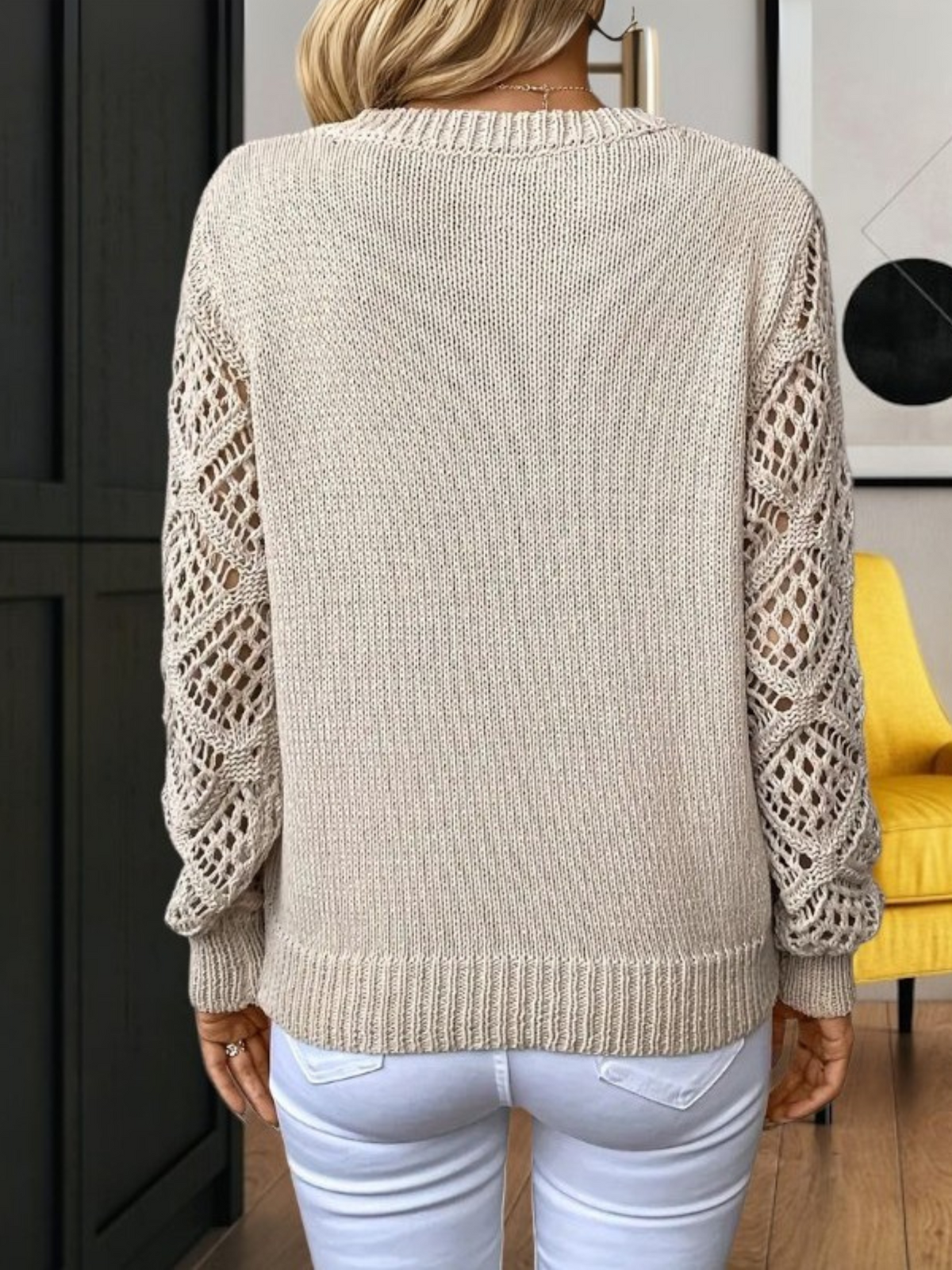 Women's V-neck jumper with long openwork sleeves and ribbed trims