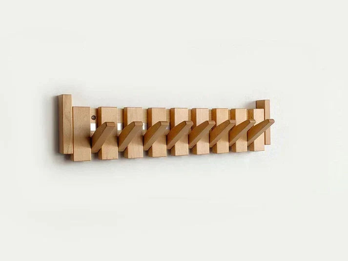 Wooden piano key wall coat rack with fold-down hooks