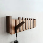 Wooden piano key wall coat rack with fold-down hooks