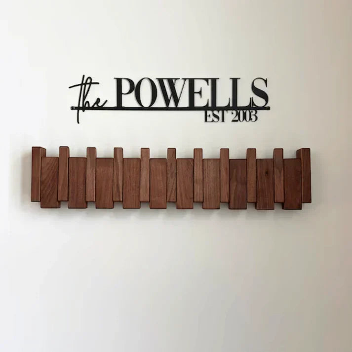 Wooden piano key wall coat rack with fold-down hooks