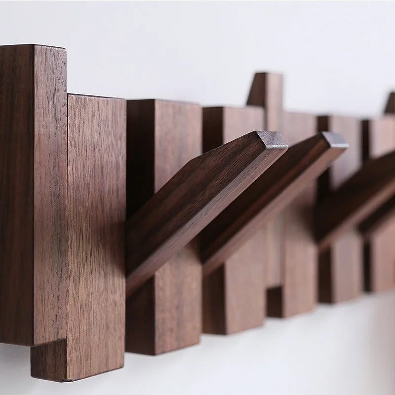 Wooden piano key wall coat rack with fold-down hooks