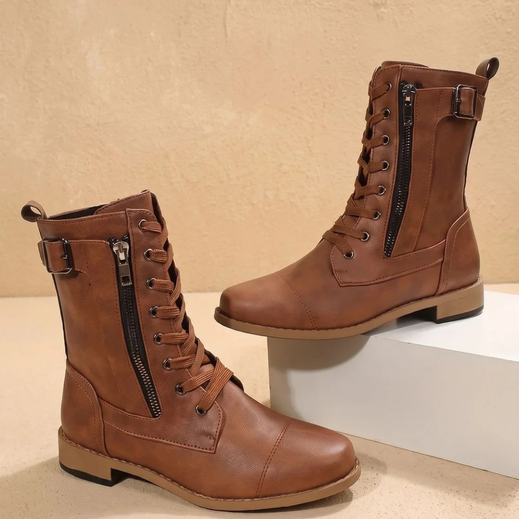 Women's mid-calf lace-up boots with side zips and buckle straps