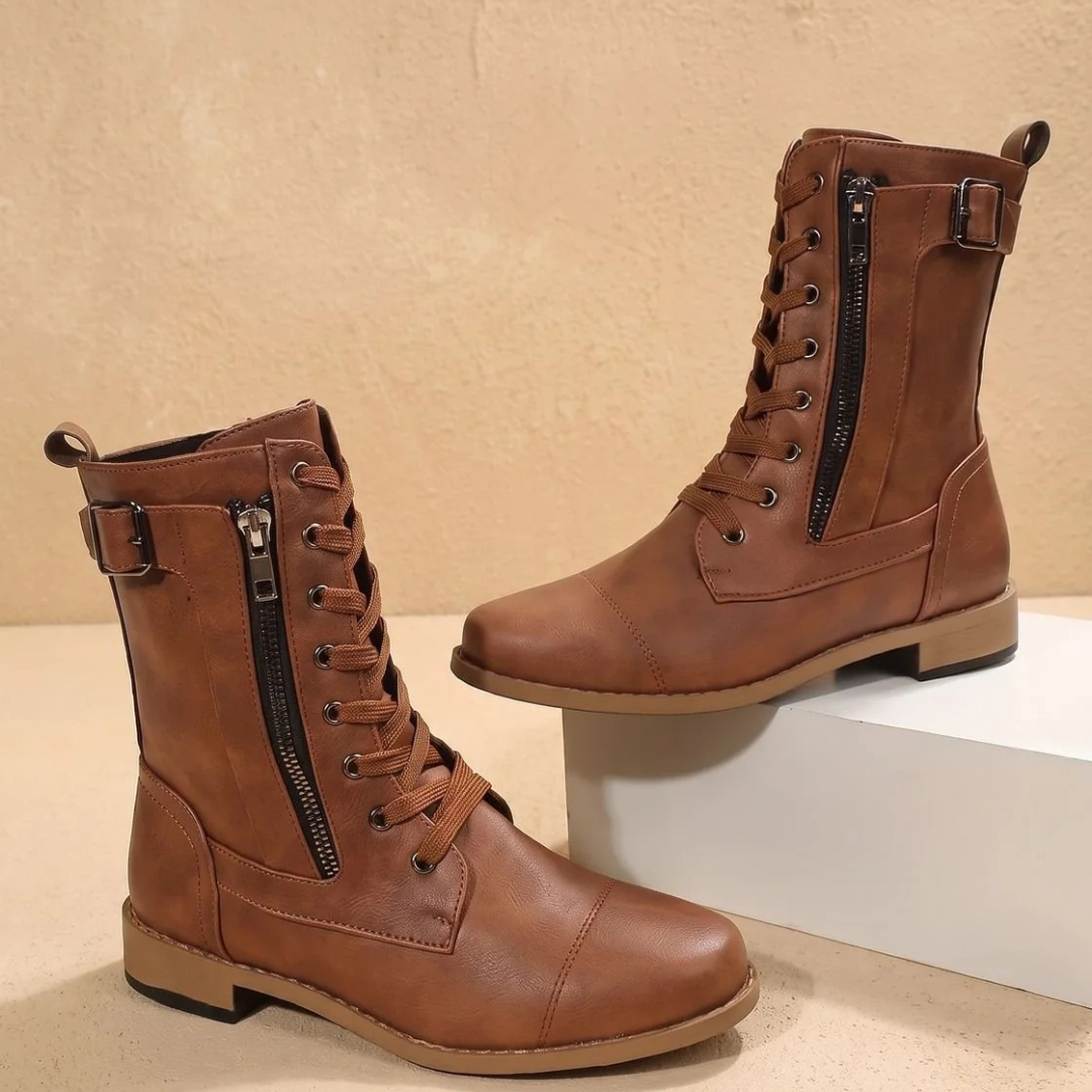 Women's mid-calf lace-up boots with side zips and buckle straps