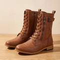 Women's mid-calf lace-up boots with side zips and buckle straps