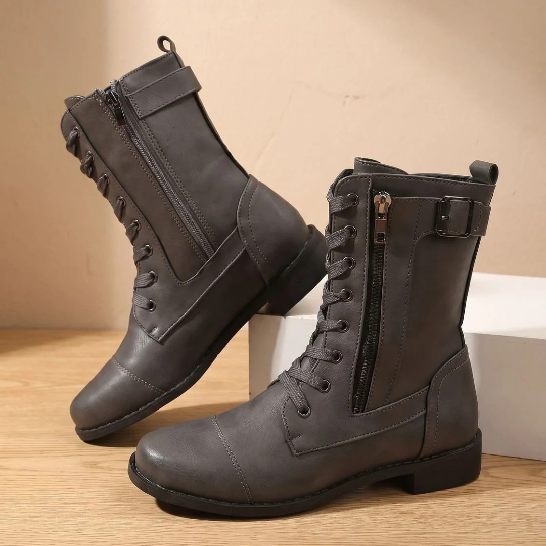 Women's mid-calf lace-up boots with side zips and buckle straps