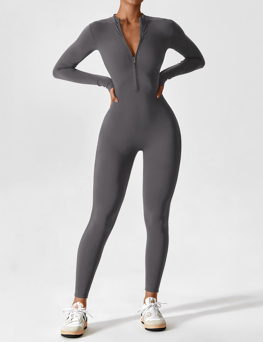 Women's fitted long-sleeve jumpsuit with mock neck and front zipper