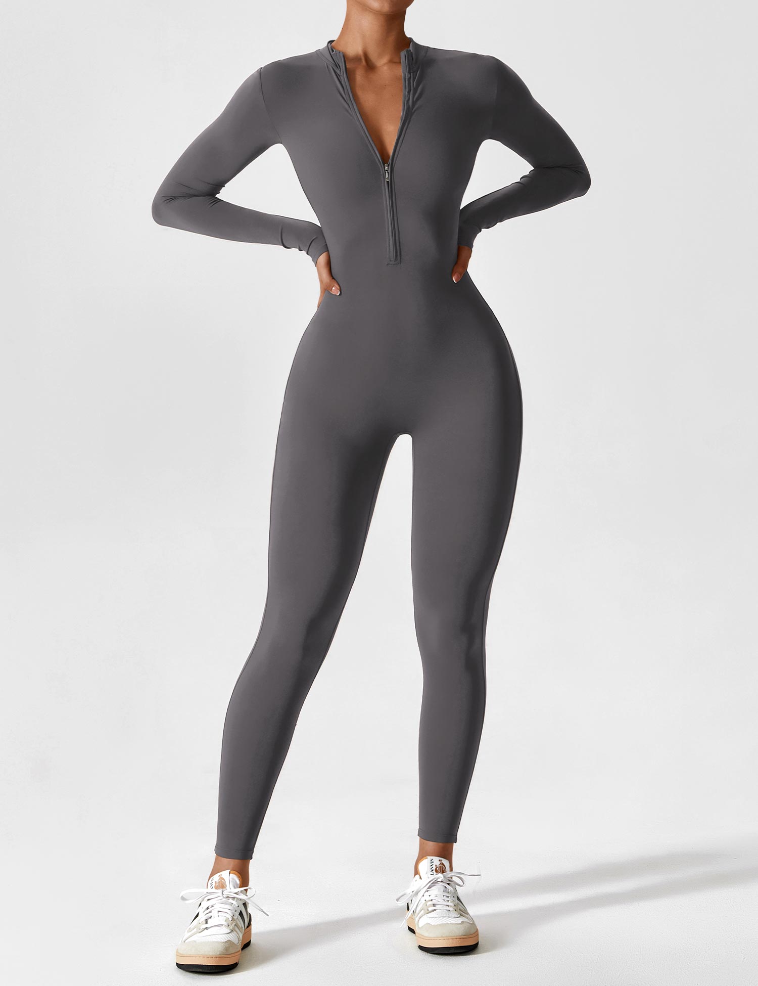 Women's fitted long-sleeve jumpsuit with mock neck and front zipper