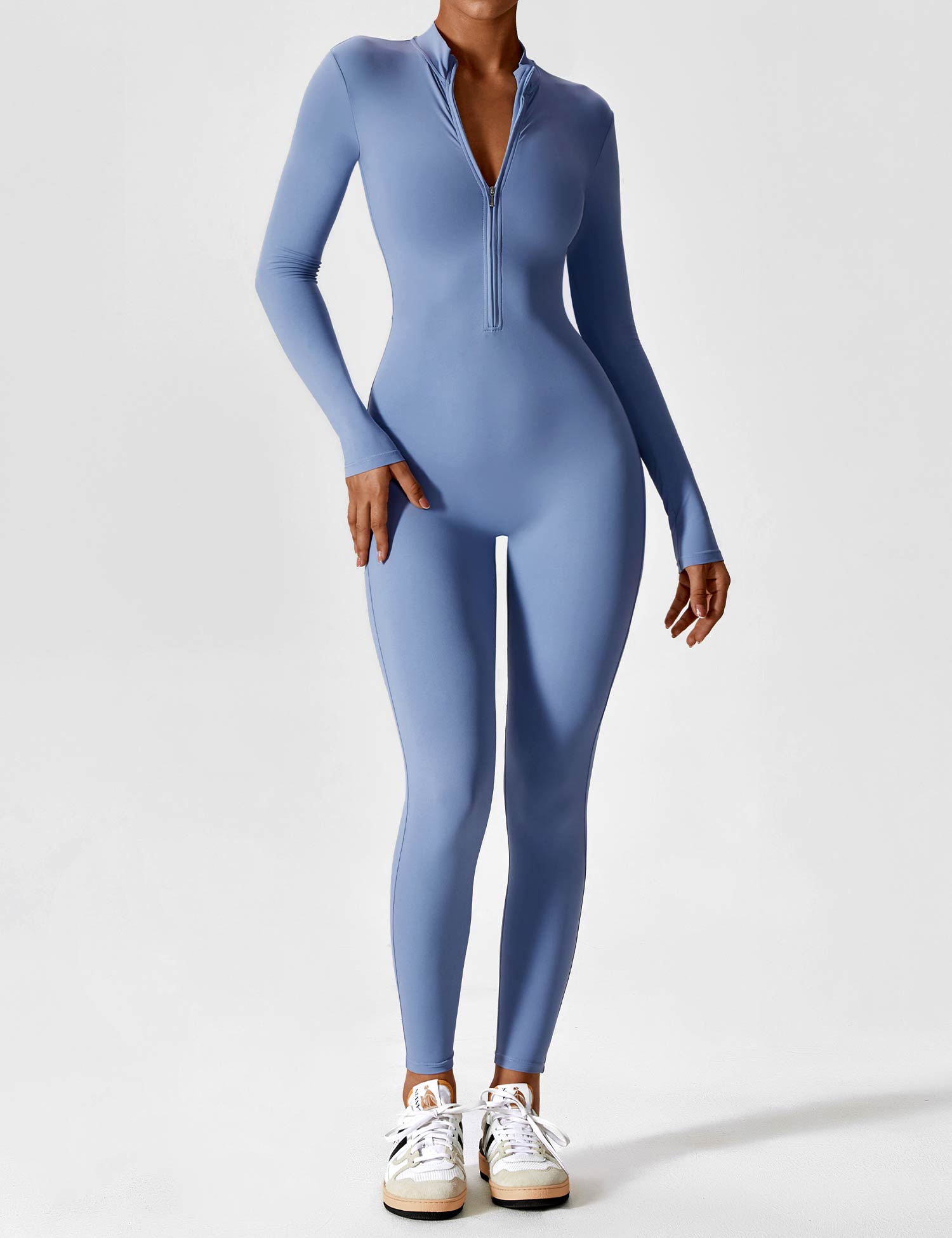 Women's fitted long-sleeve jumpsuit with mock neck and front zipper