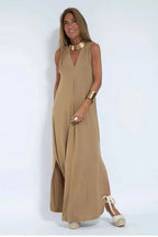 Women's sleeveless V-neck maxi dress with centre pleats and flowing floor-length skirt