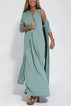 Women's sleeveless V-neck maxi dress with centre pleats and flowing floor-length skirt