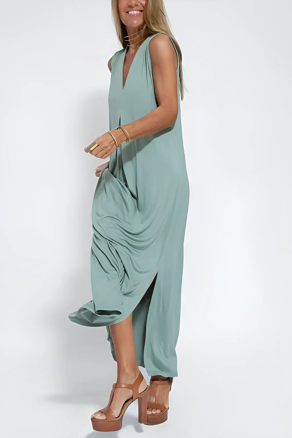 Women's sleeveless V-neck maxi dress with centre pleats and flowing floor-length skirt