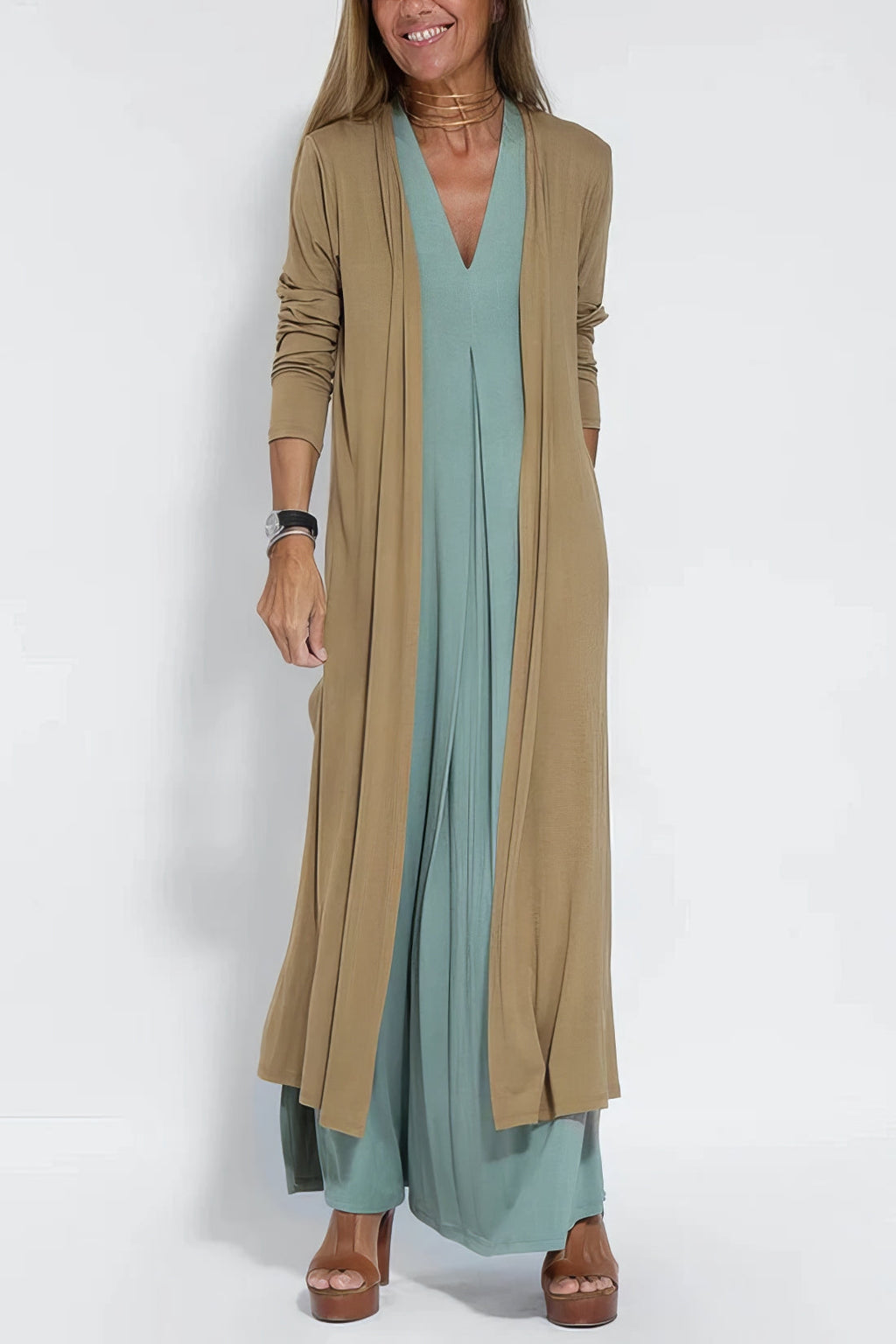 Women's sleeveless V-neck maxi dress with centre pleats and flowing floor-length skirt