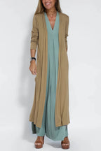 Women's sleeveless V-neck maxi dress with centre pleats and flowing floor-length skirt