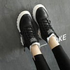Women's high-top winter boots with faux fur collars