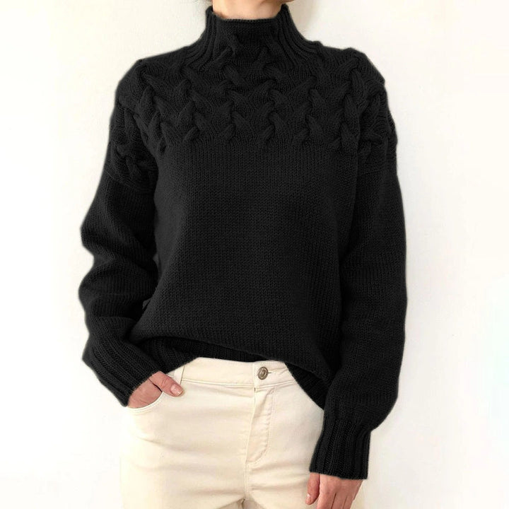 Women's cable knit turtleneck sweater with long sleeves